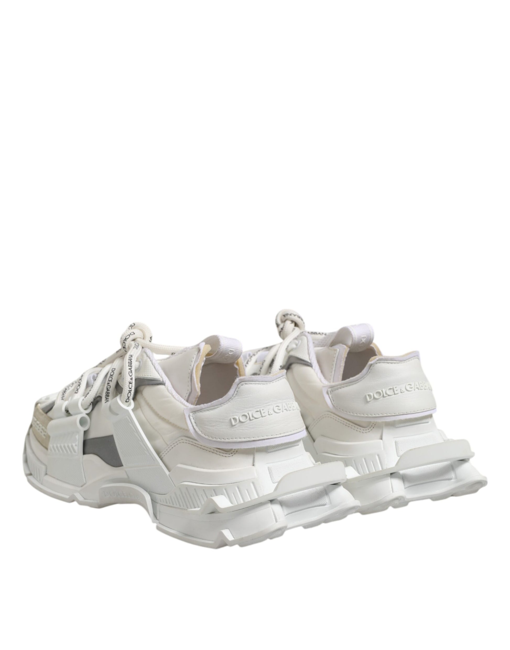 Pair of white sneakers with laces