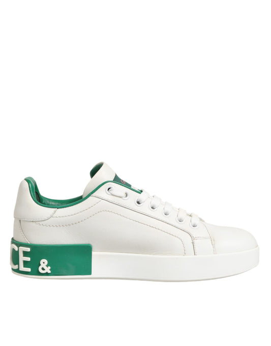 White sneaker with green accents and a logo on the side