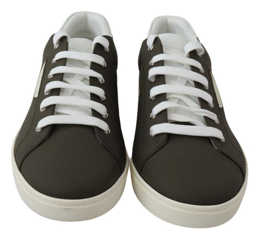 Pair of black sneakers with white laces