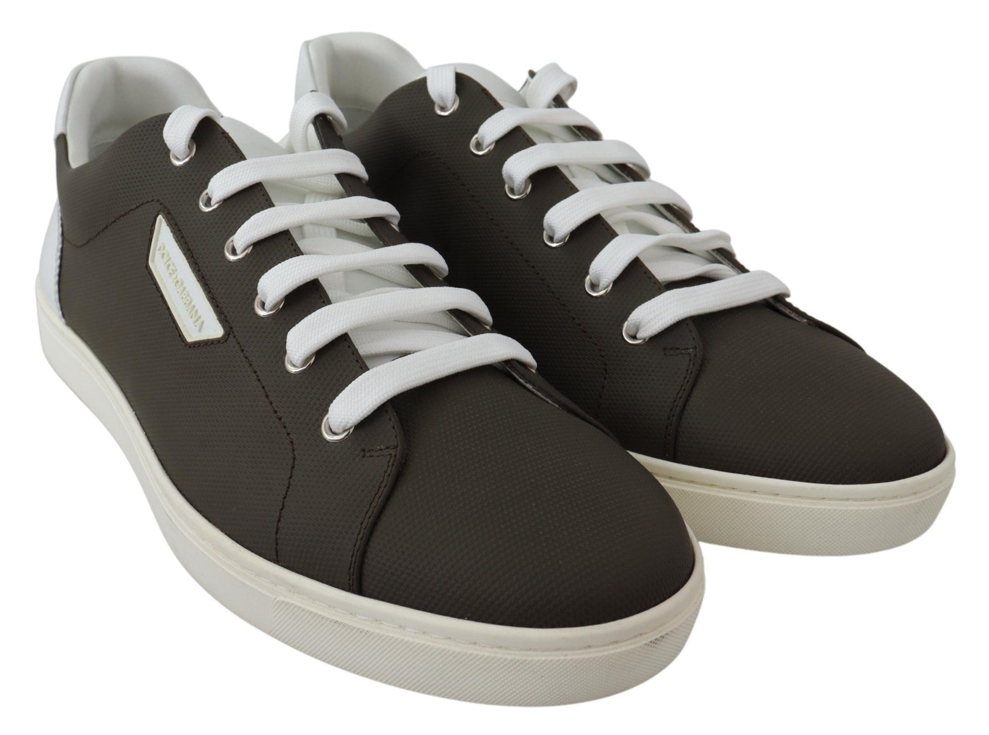 Pair of black sneakers with white laces