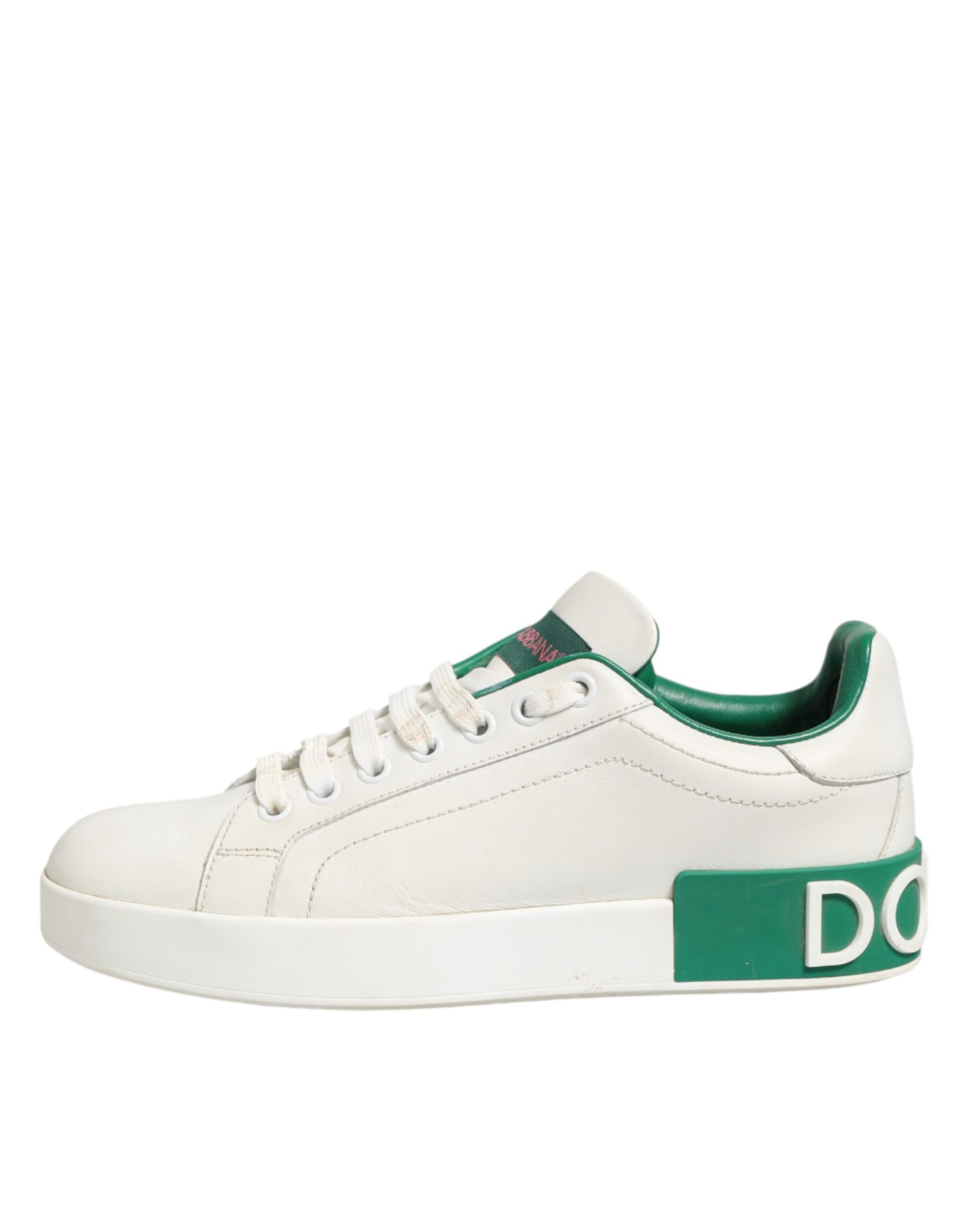 White sneaker with green accents