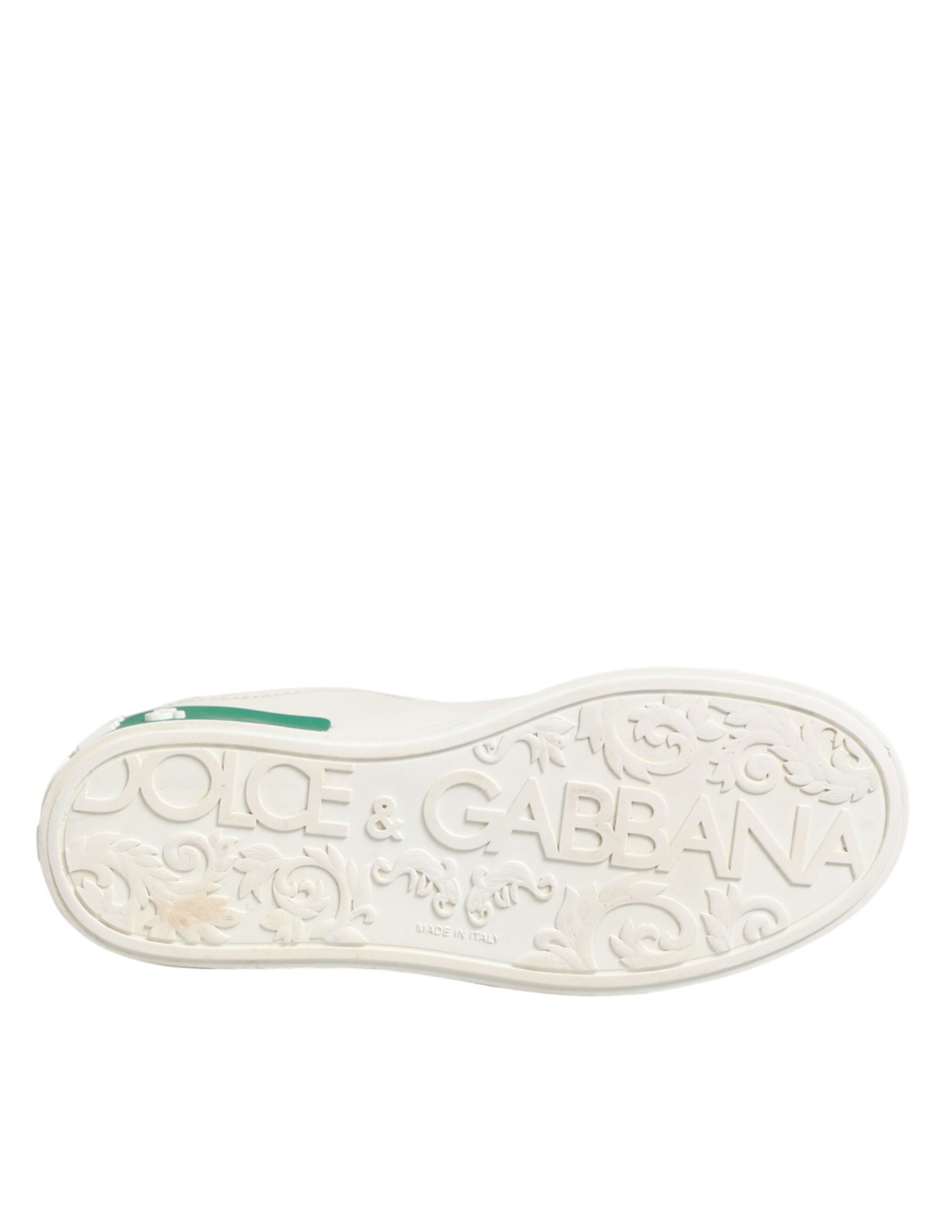 White shoe with black writing on sole