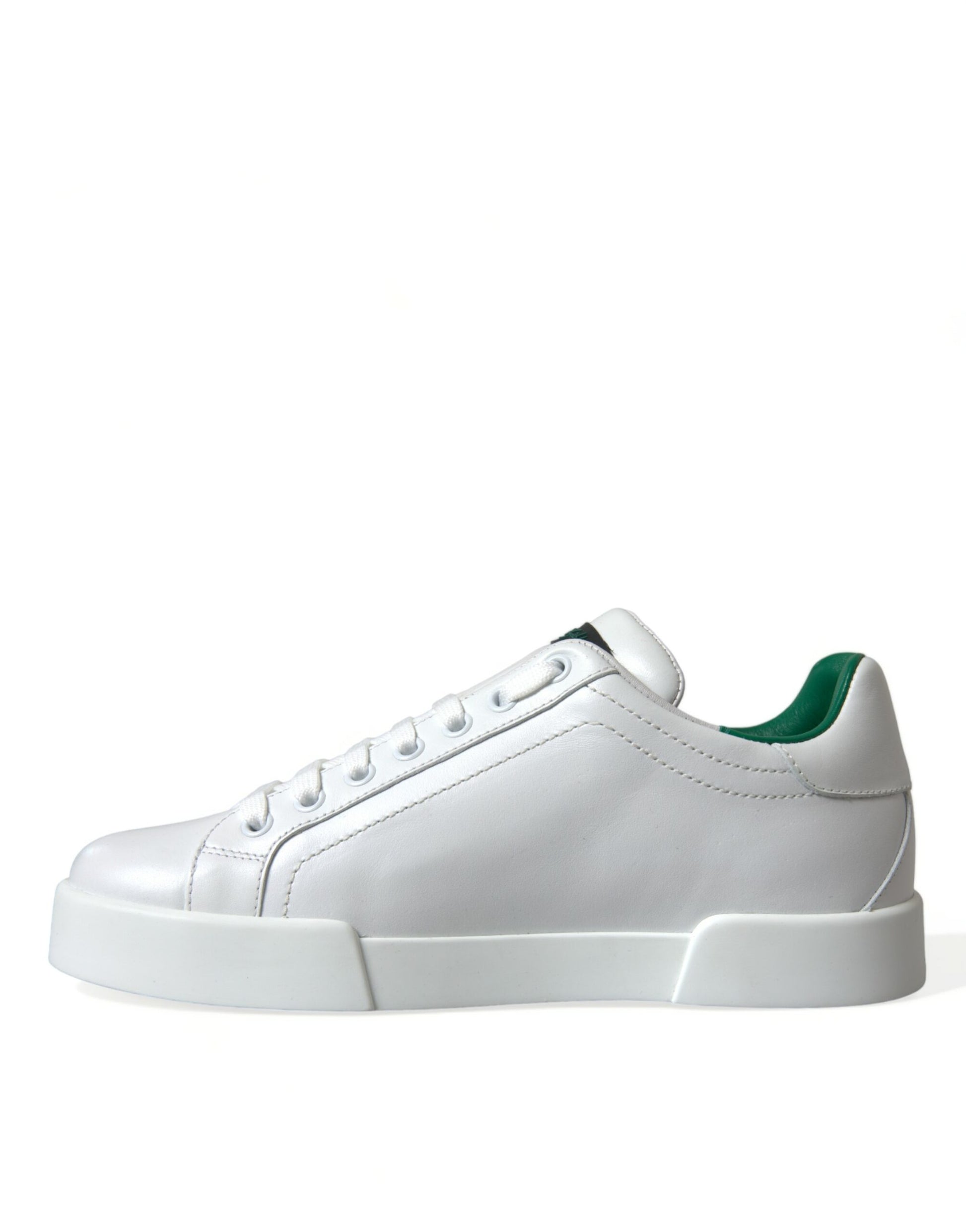 White sneaker with green laces and white sole