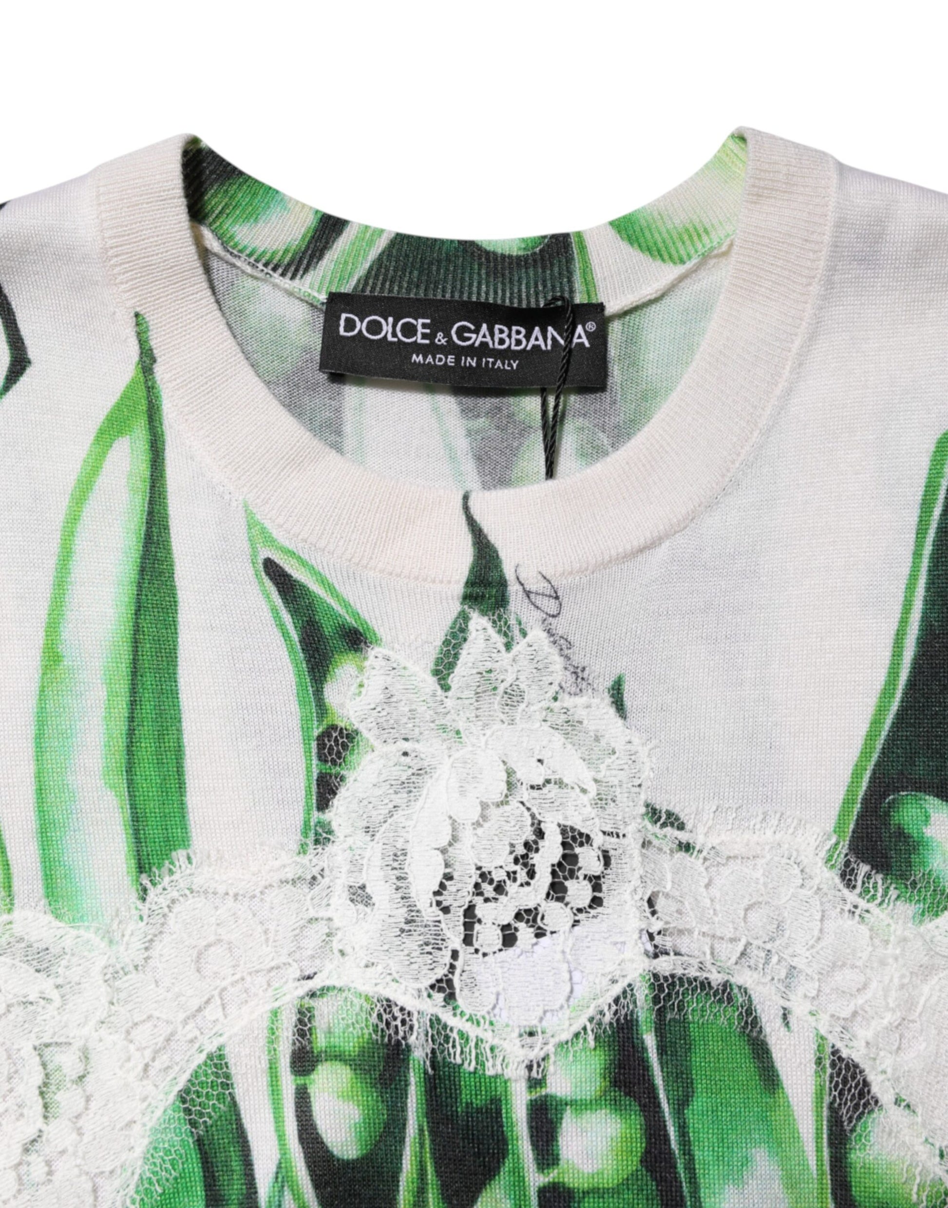 Green and white sweater with lace detailing