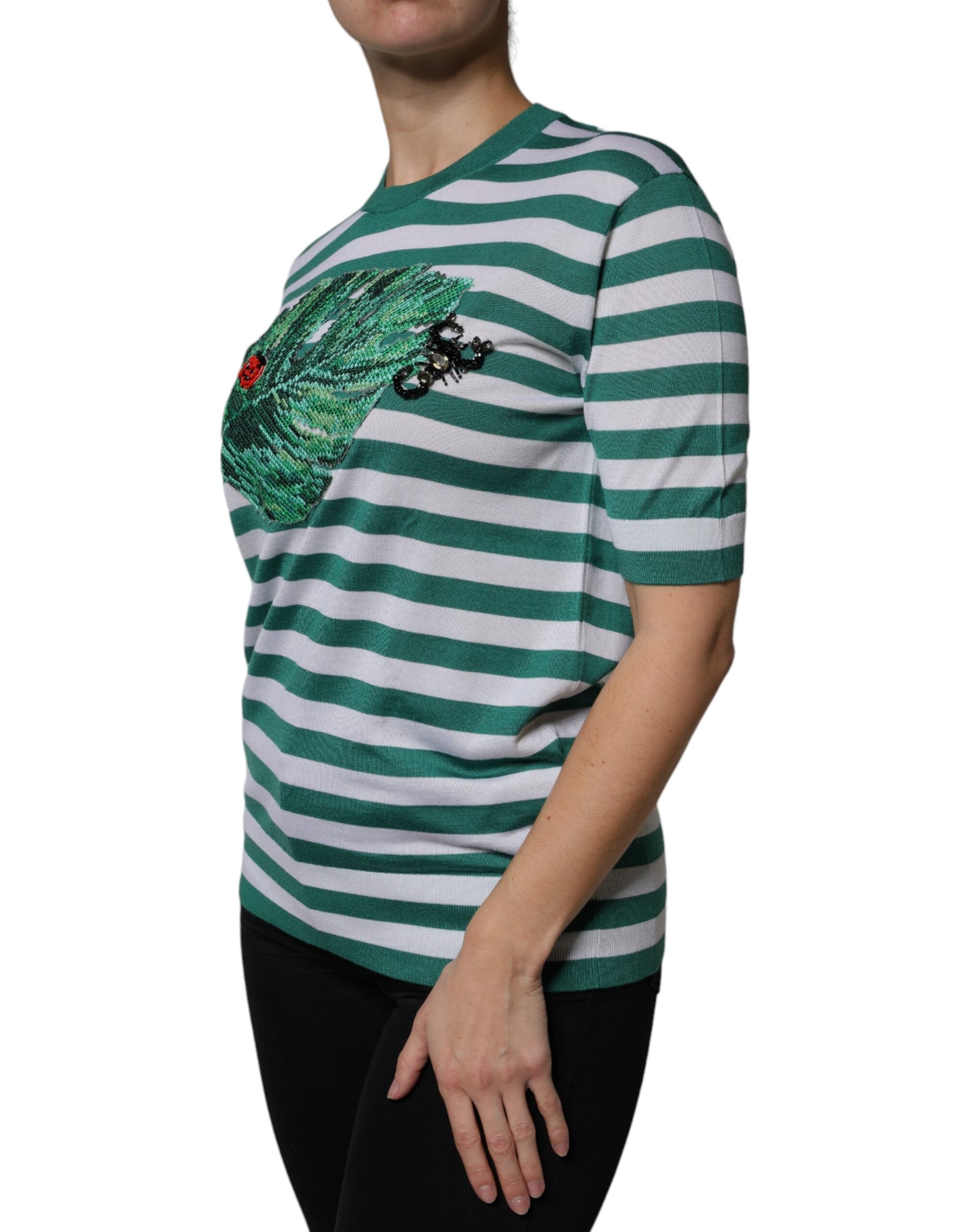 Green and white striped shirt with graphic design on front