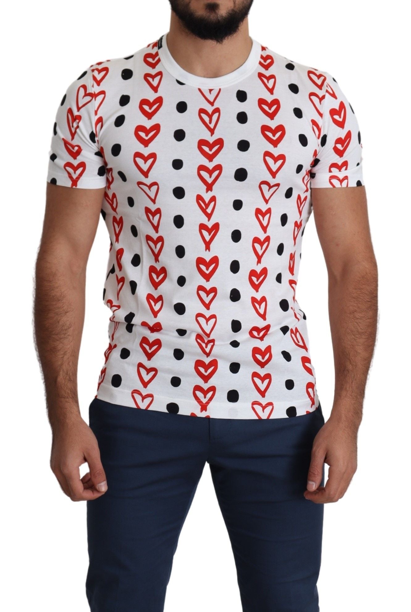 Man wearing graphic t-shirt with hearts and polka dots
