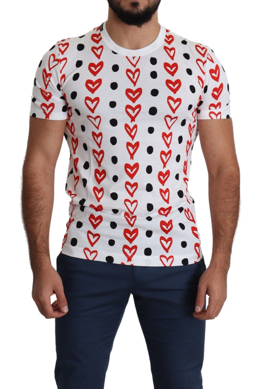 Man wearing graphic t-shirt with hearts and polka dots