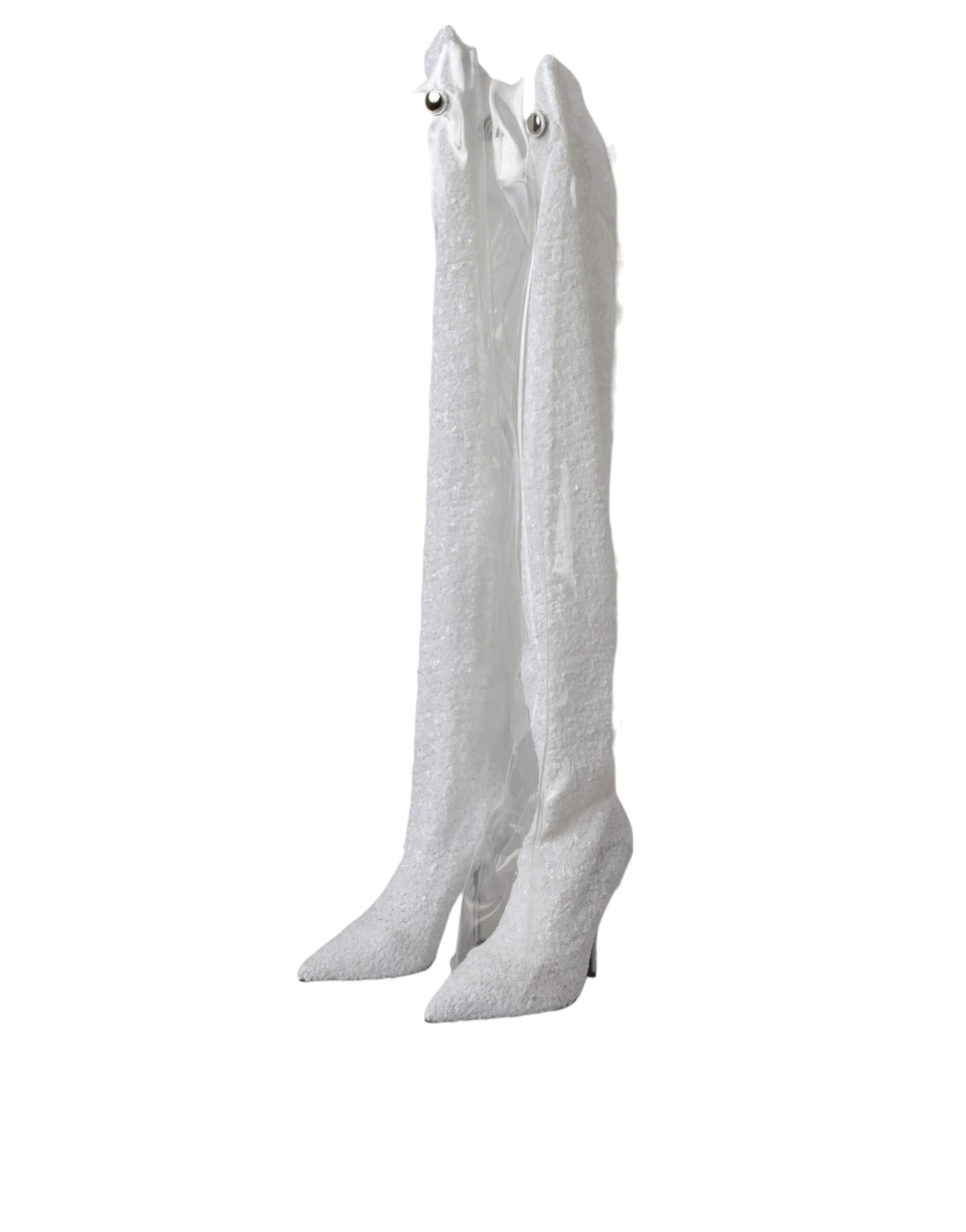 Pair of white knee high boots with heels