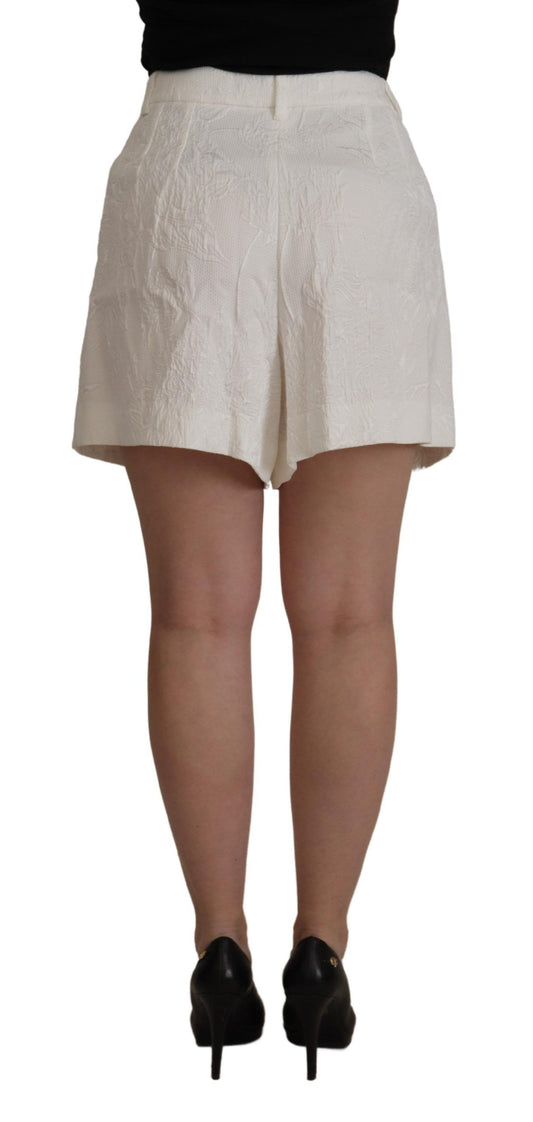 Woman wearing shorts and black heels