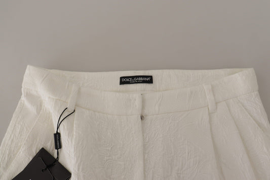White fabric garment with black tag on hanger