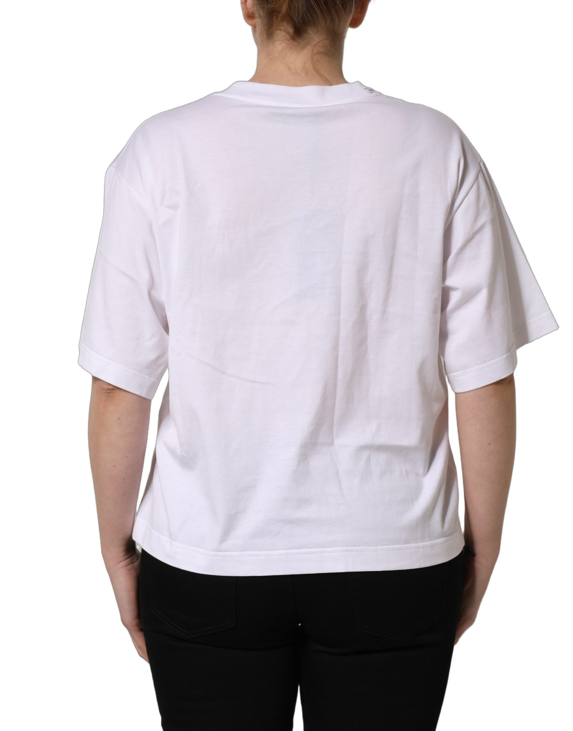 A white round neck t-shirt with a flag patch on the back