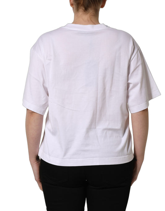A white round neck t-shirt with a flag patch on the back