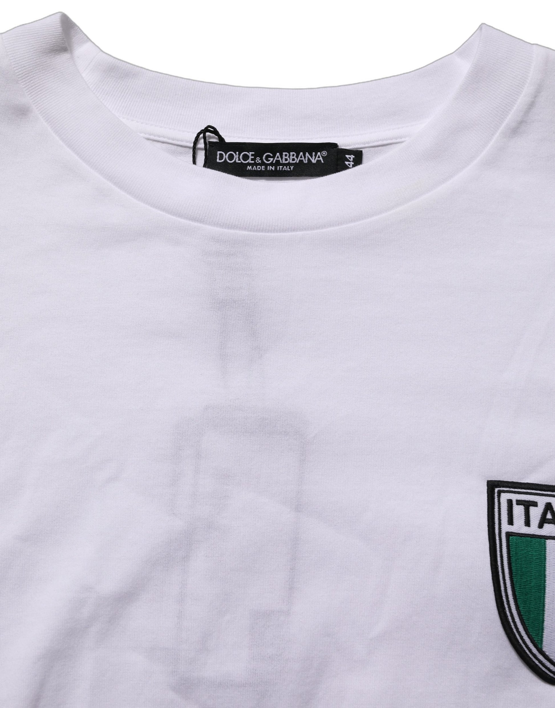 A white round neck t-shirt with a patch of an italian flag on the left chest