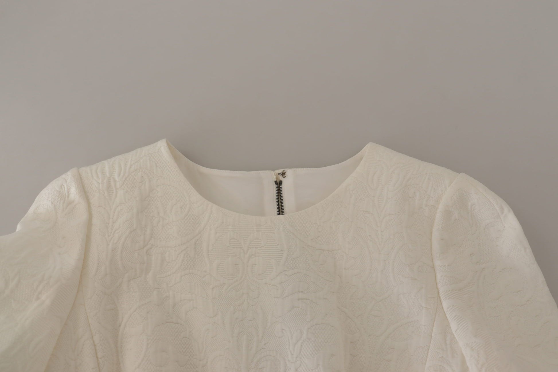 A white floral brocade midi dress by Dolce & Gabbana