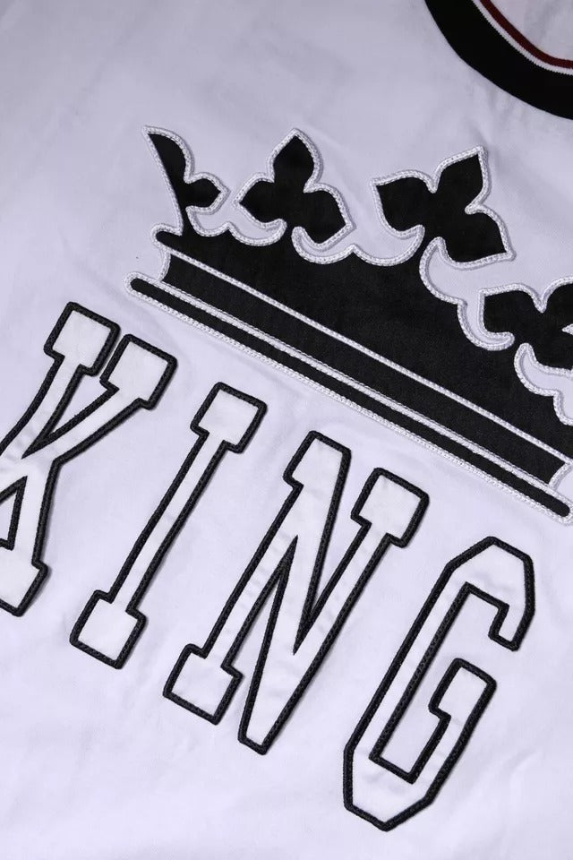 White t-shirt with black lettering and crown embroidery
