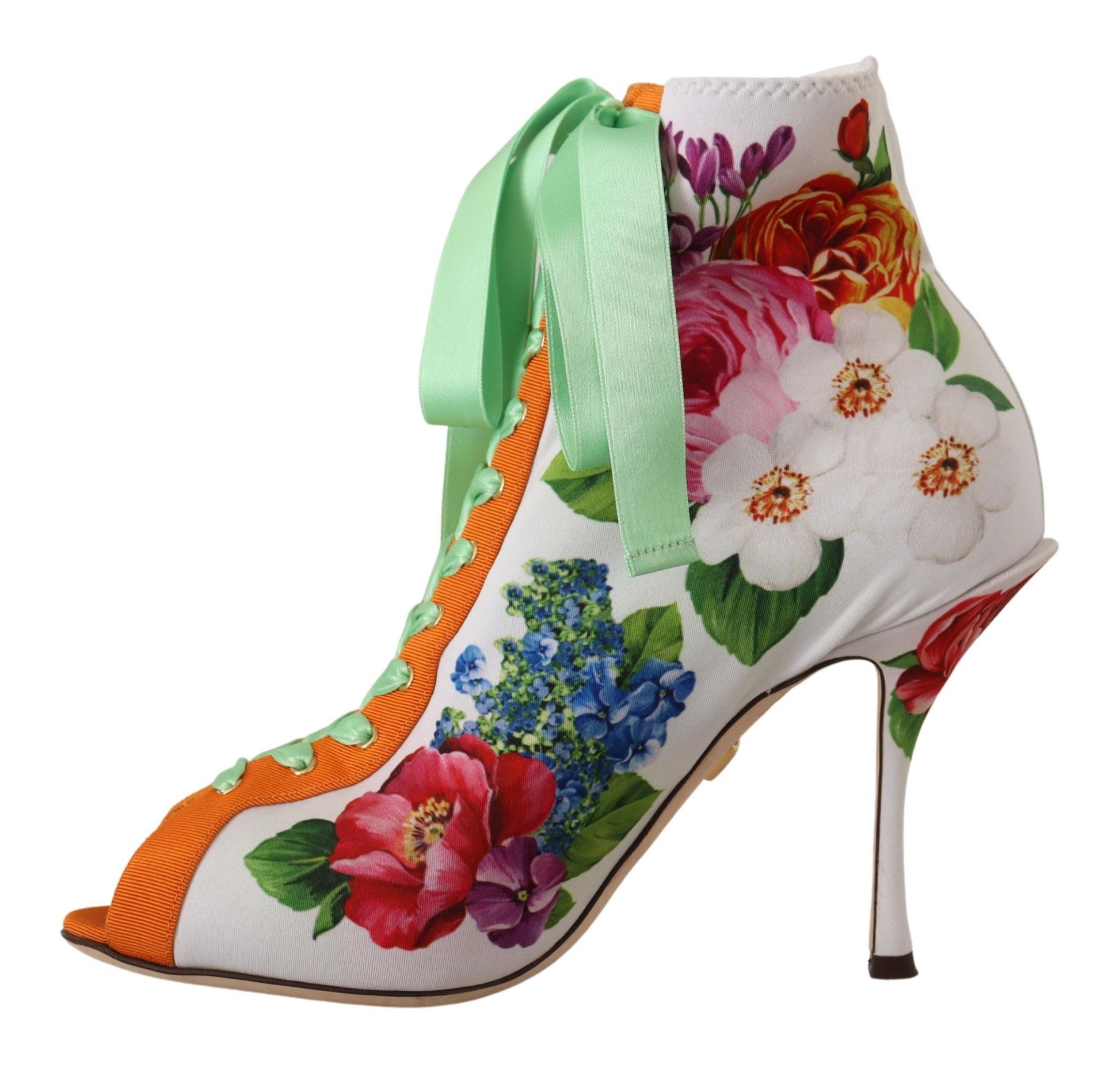 Decorative high heel shoe with floral pattern and green bow