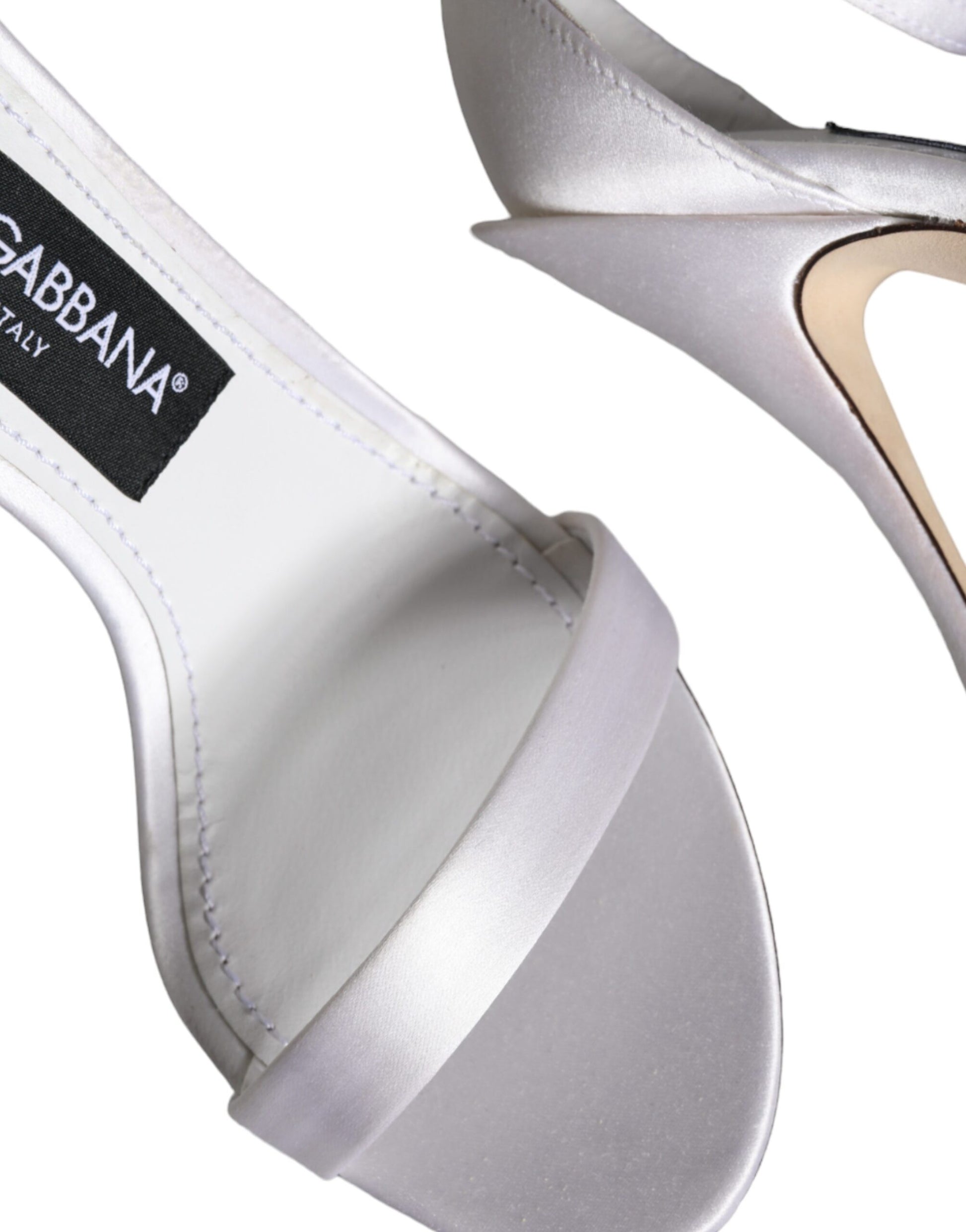 High heel shoe with strap over toe
