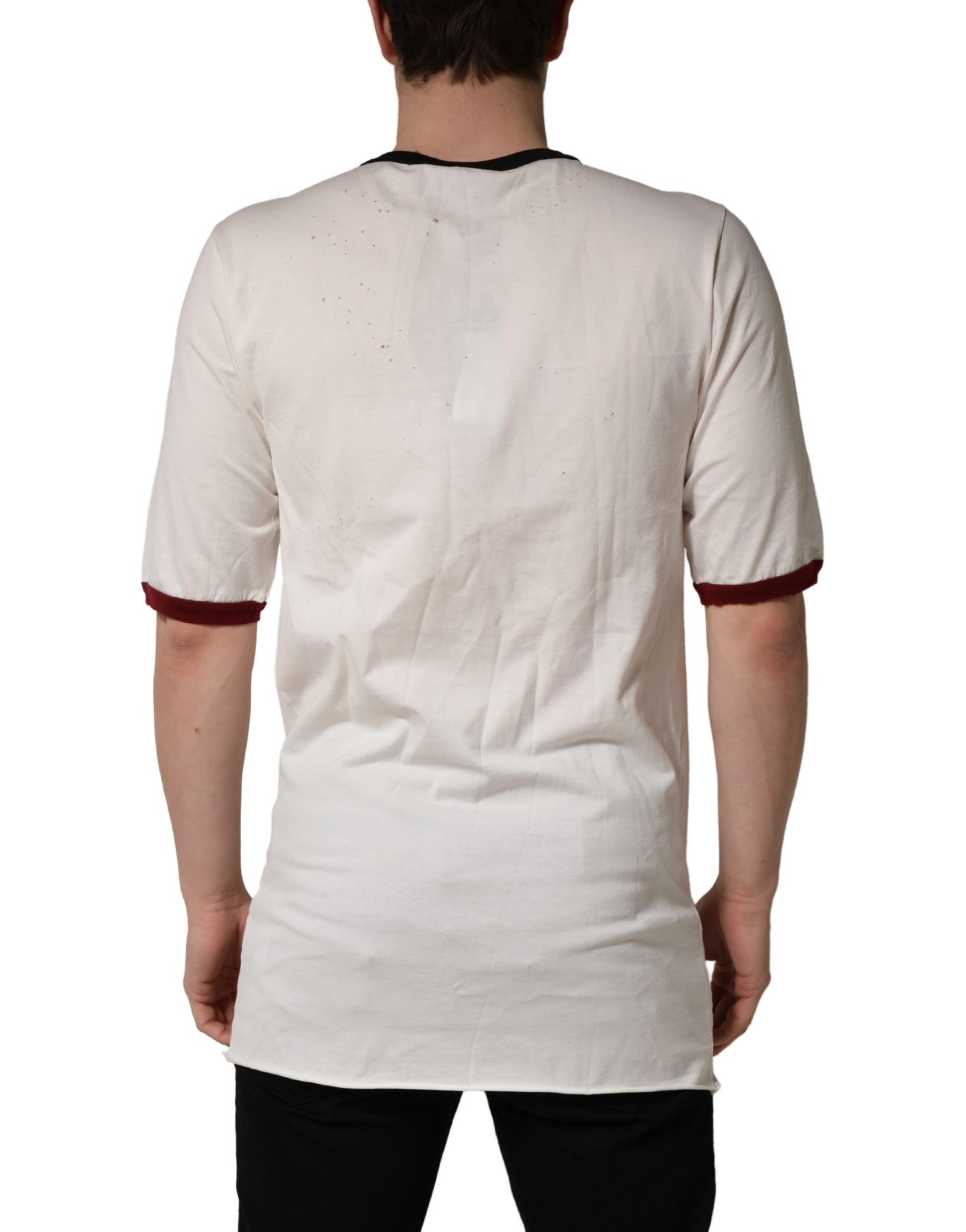 A white jersey t-shirt with a king of love print on the back