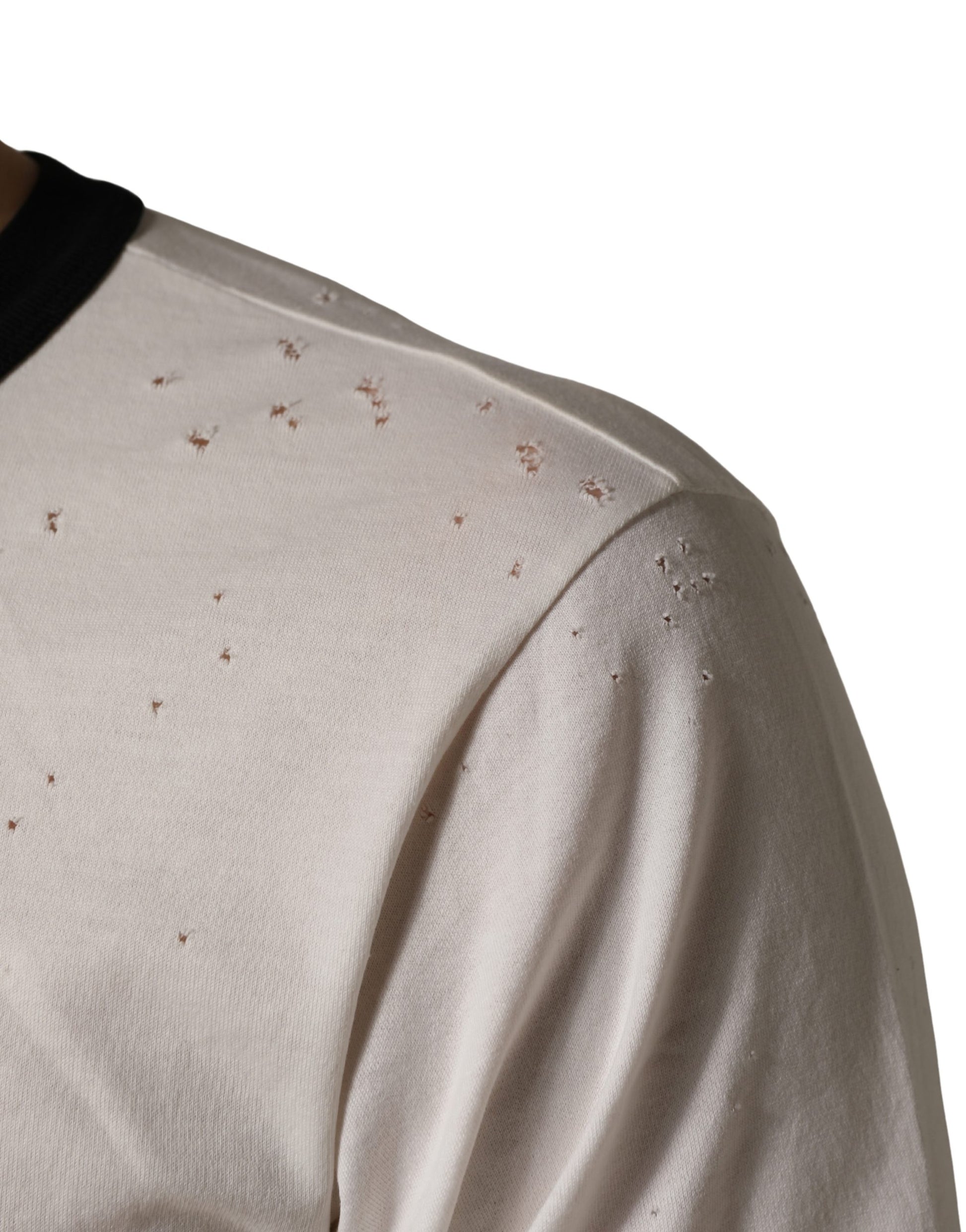 A white jersey t-shirt with a king of love print and gold sequins