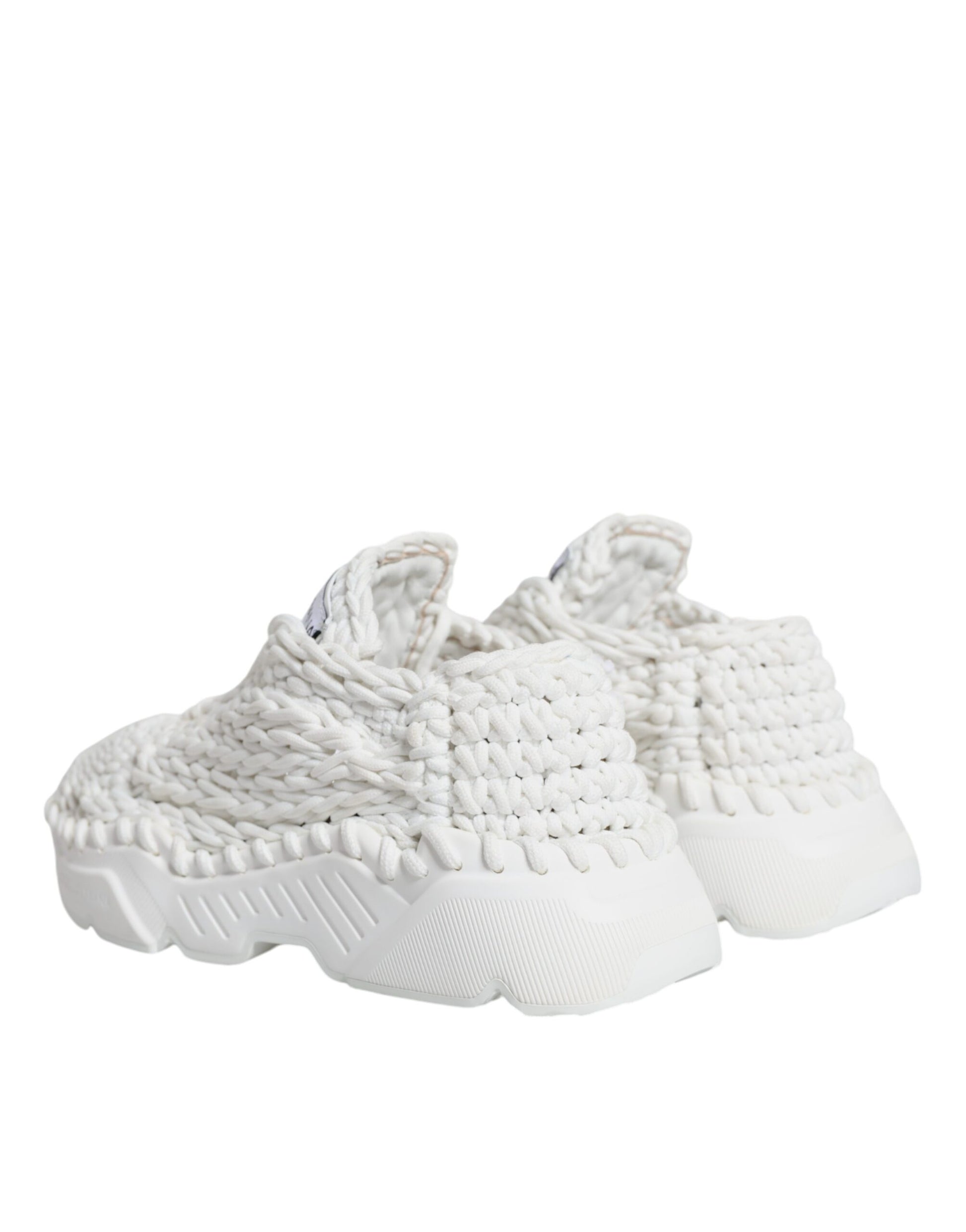 White knit sneakers with laces, featuring a textured design and brand logo on side