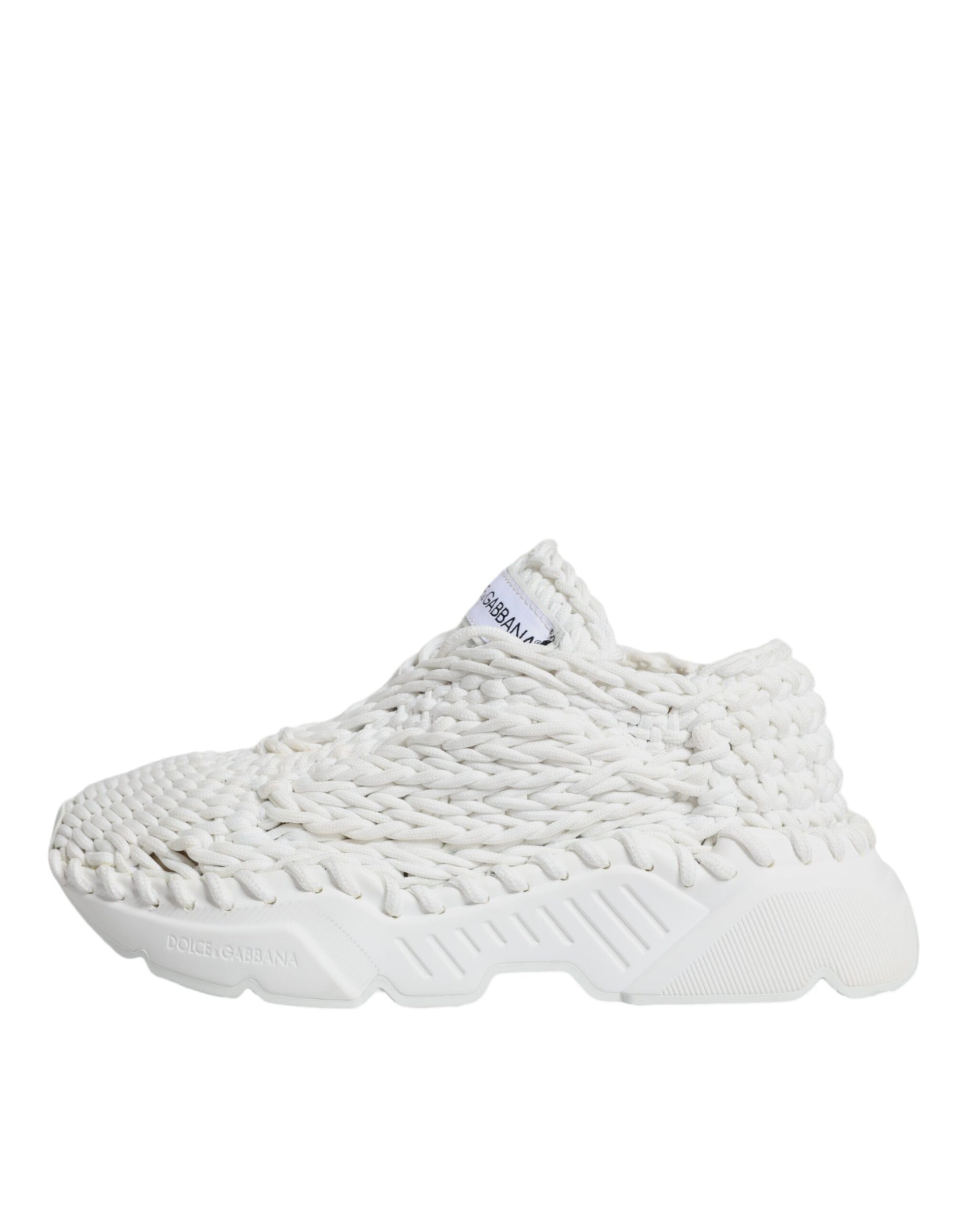 White knit sneakers with logo on side, featuring textured design and chunky sole