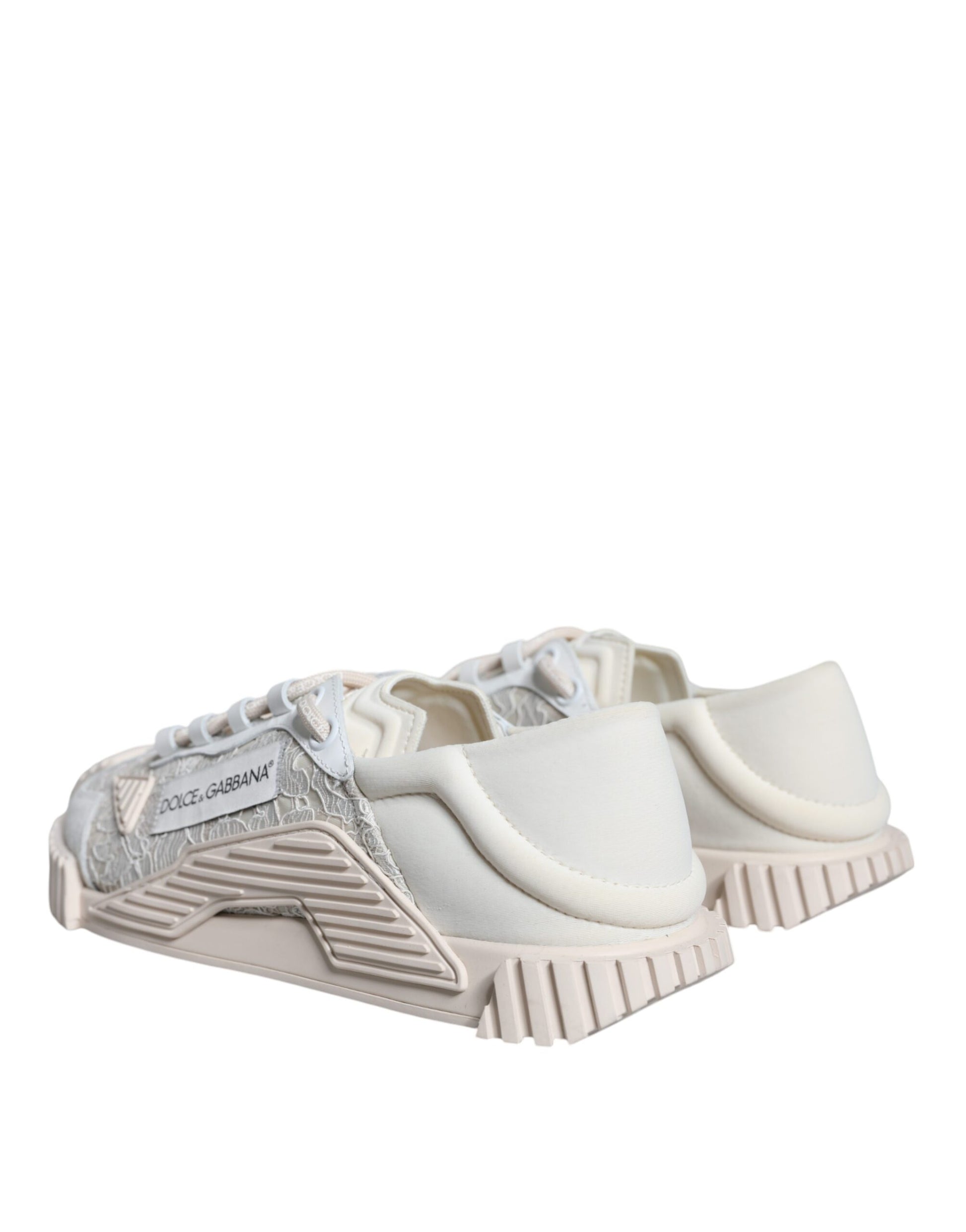 Pair of white lace-up sneakers with a low top, featuring a silver logo on the side
