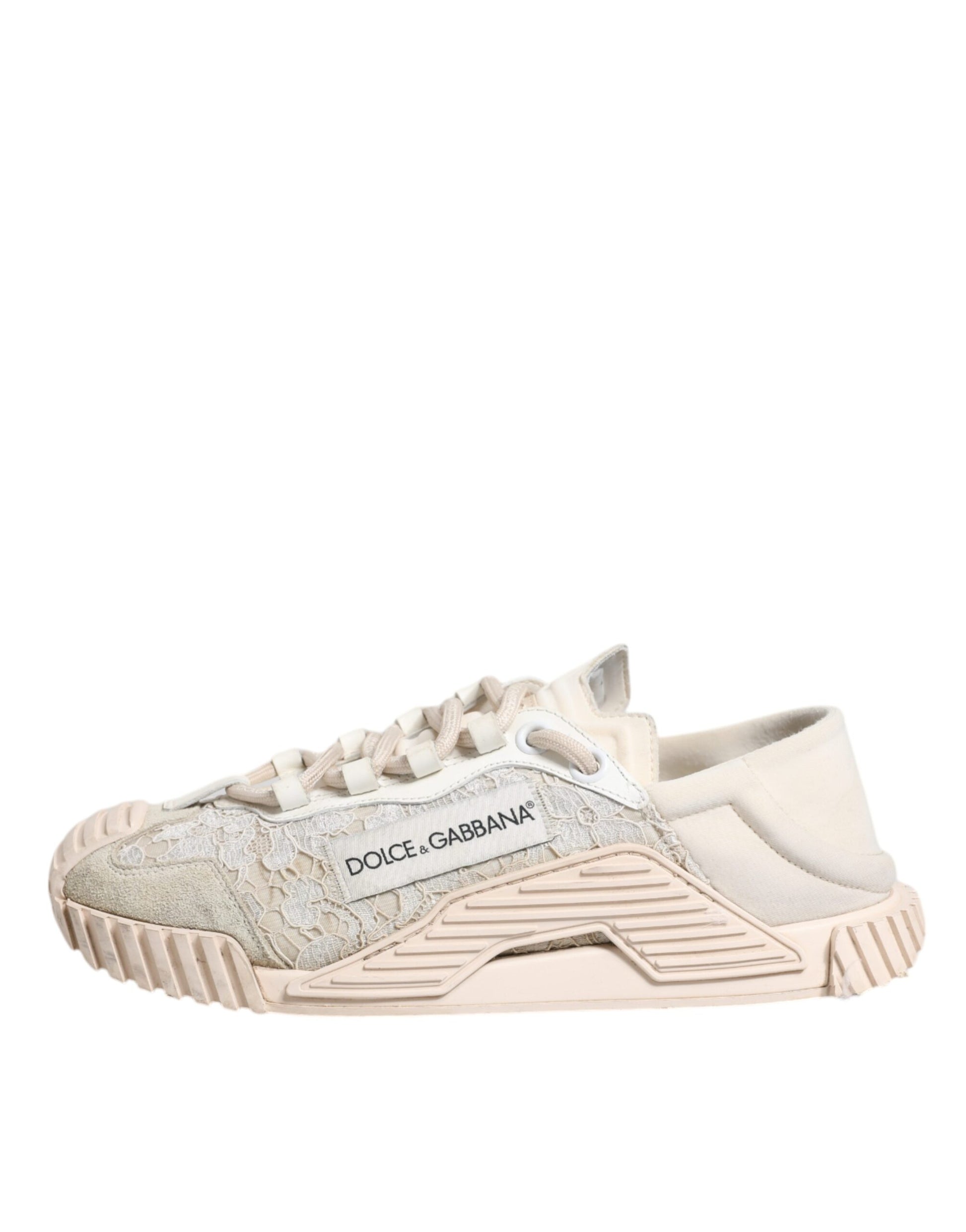 A pair of white lace-up sneakers with a glittery texture and the brand name "Dolce & Gabbana" visible on the side