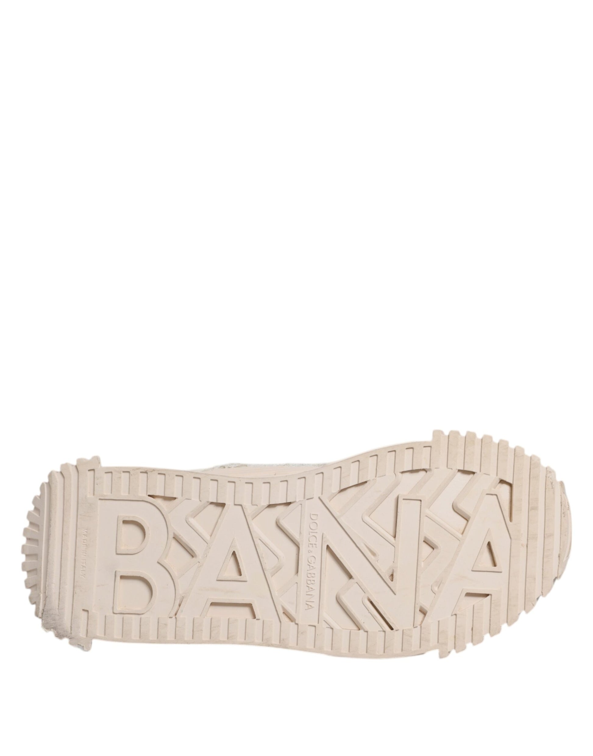 A white lace-up sneaker with a low top, featuring the word "BANANA" in capital letters on the side