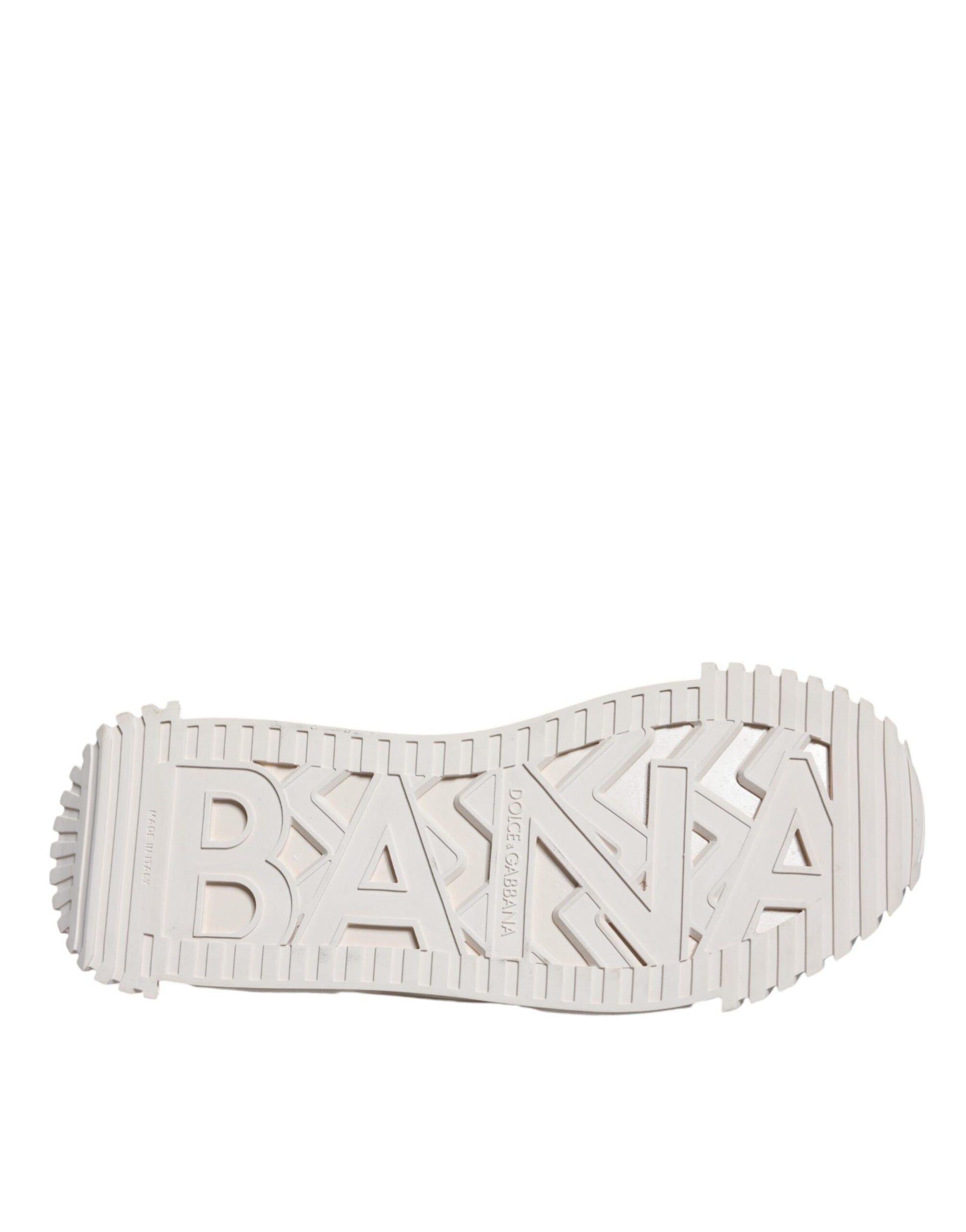 White lace-up sneakers with brand name on side