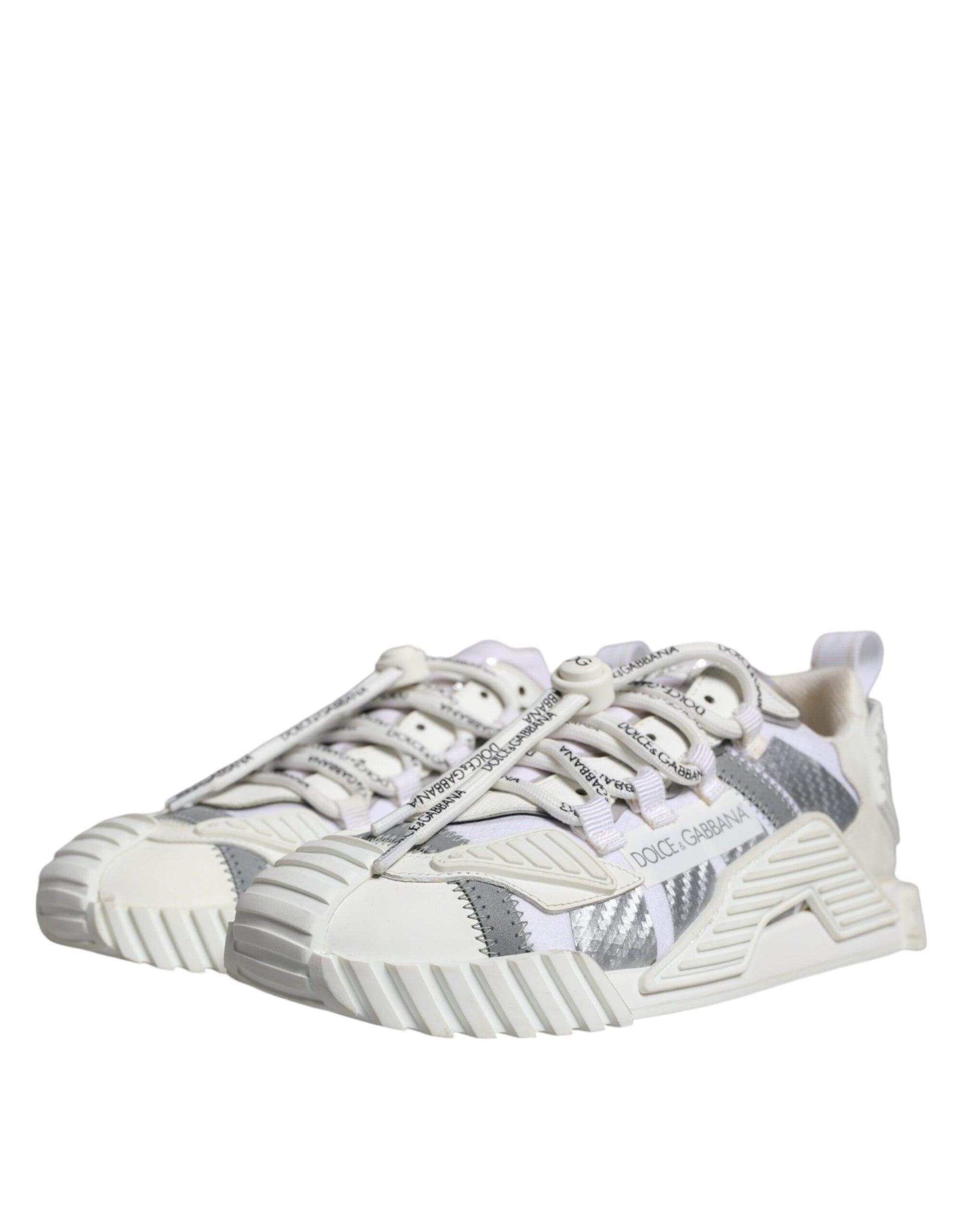 A pair of white lace-up sneakers with a low top, featuring a patterned design on the side