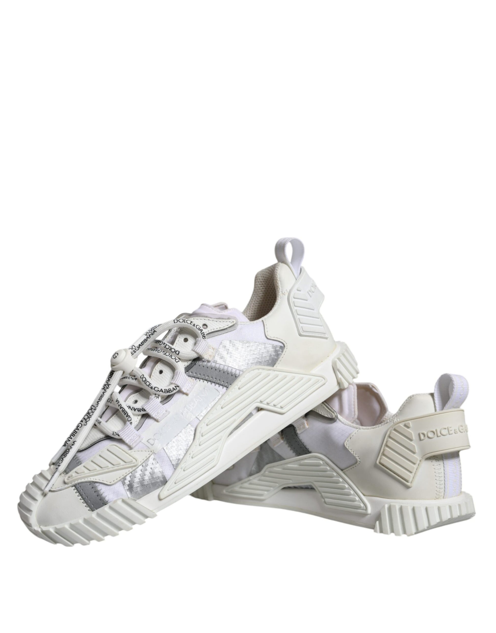 Pair of white lace-up sneakers with low top, featuring a patterned design and brand logo
