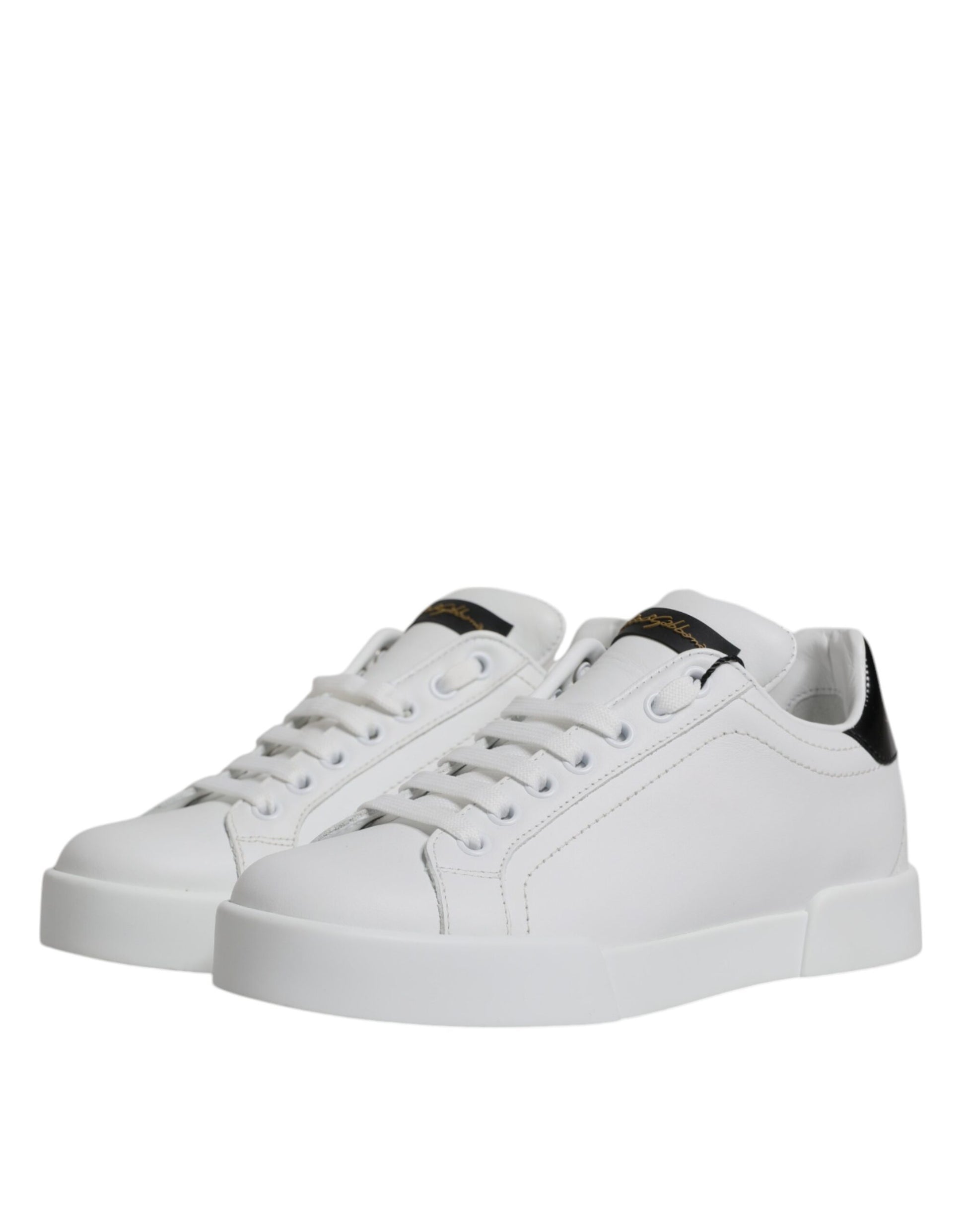 White sneakers with black laces and a small logo on the side