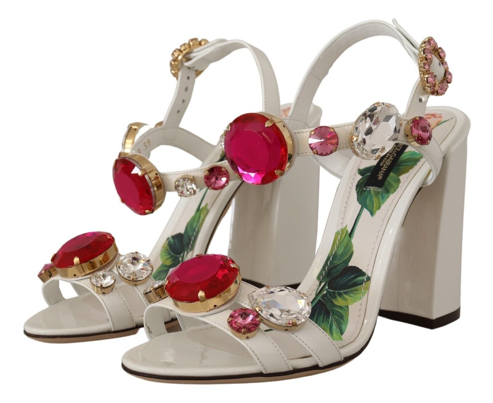 High heel shoes with red stones and floral design on top of platform