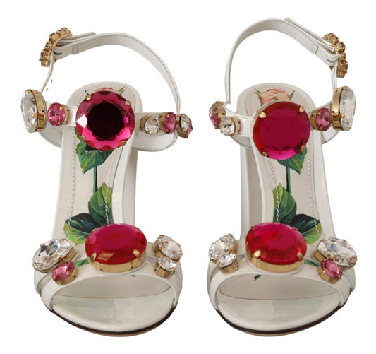 Pair of women's high heel sandals with red gemstones and floral design