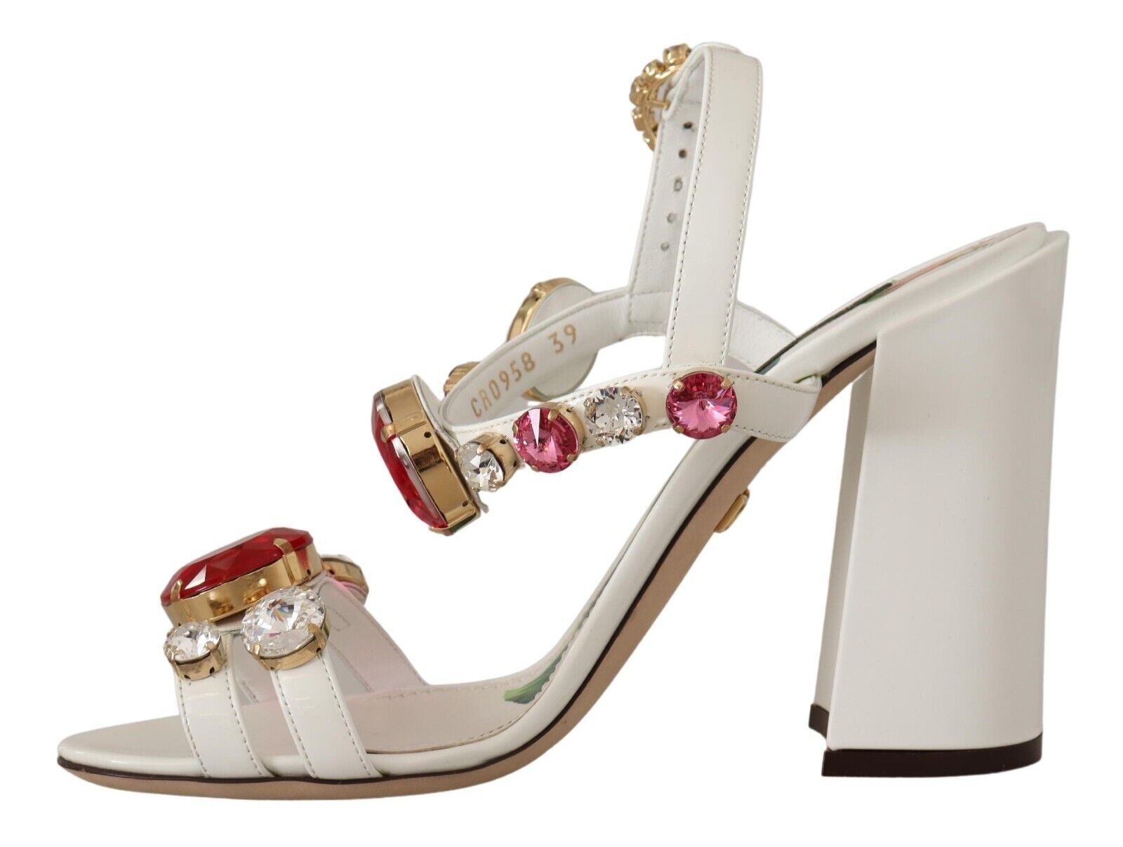 White high heel sandal with multiple straps and embellishments including pink gemstones