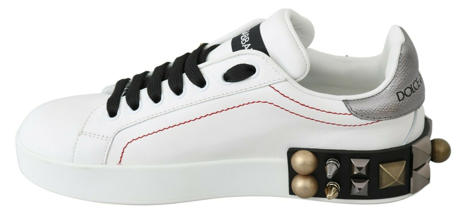 White sneakers with red and black accents