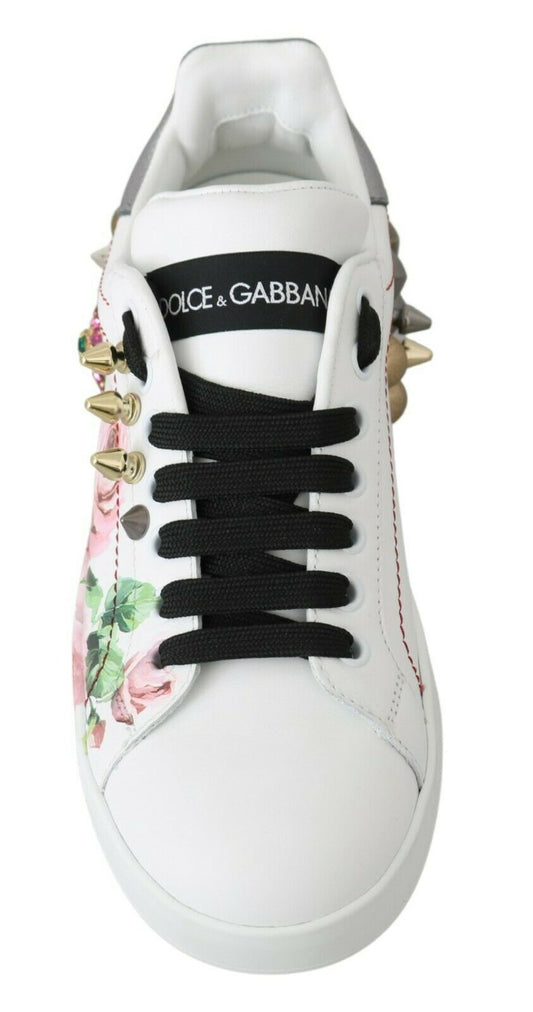 White sneaker with floral pattern on side and black laces