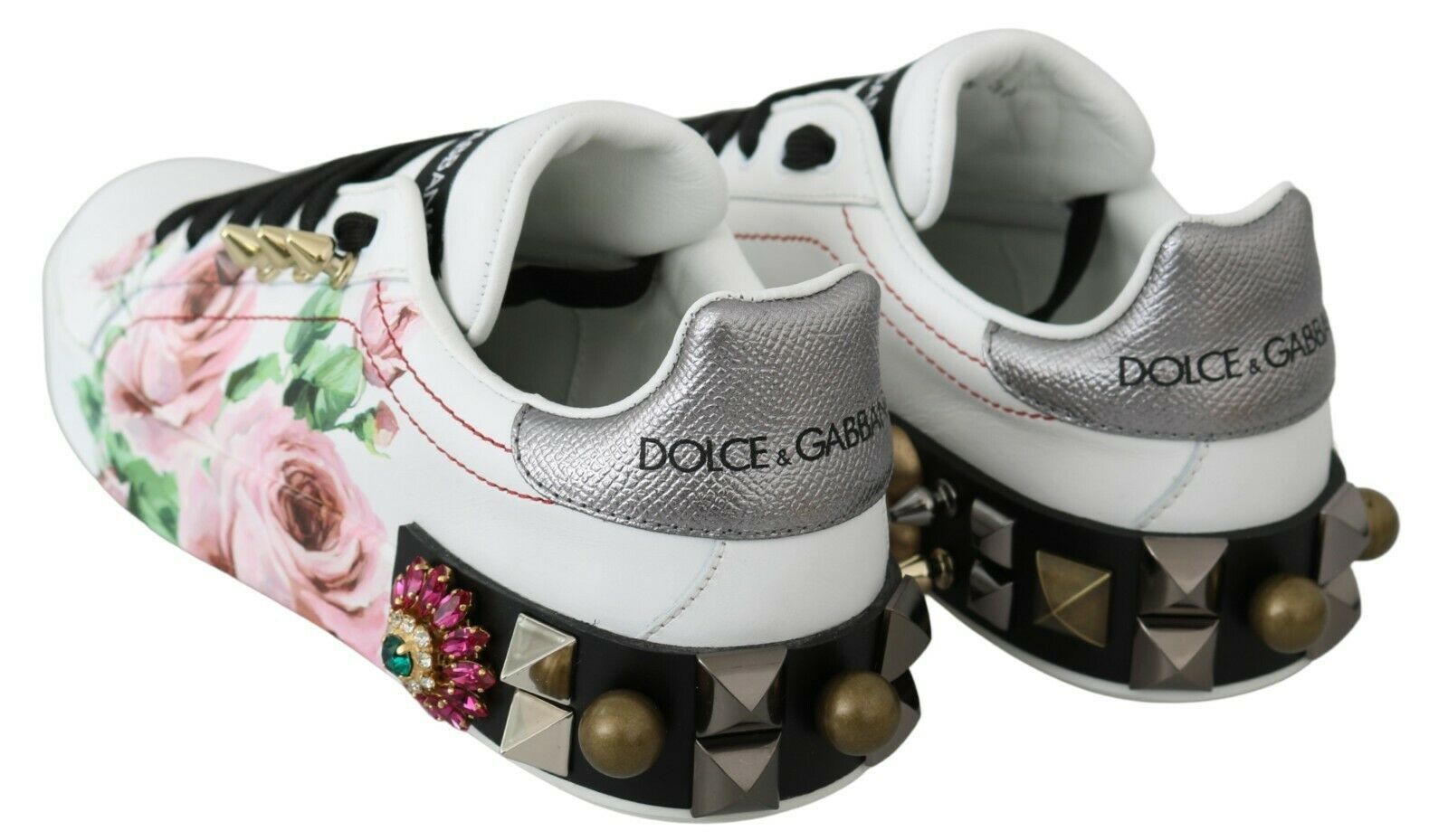 Pair of children's shoes with floral pattern and studded details