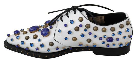 White shoes with blue and gold jewels on top