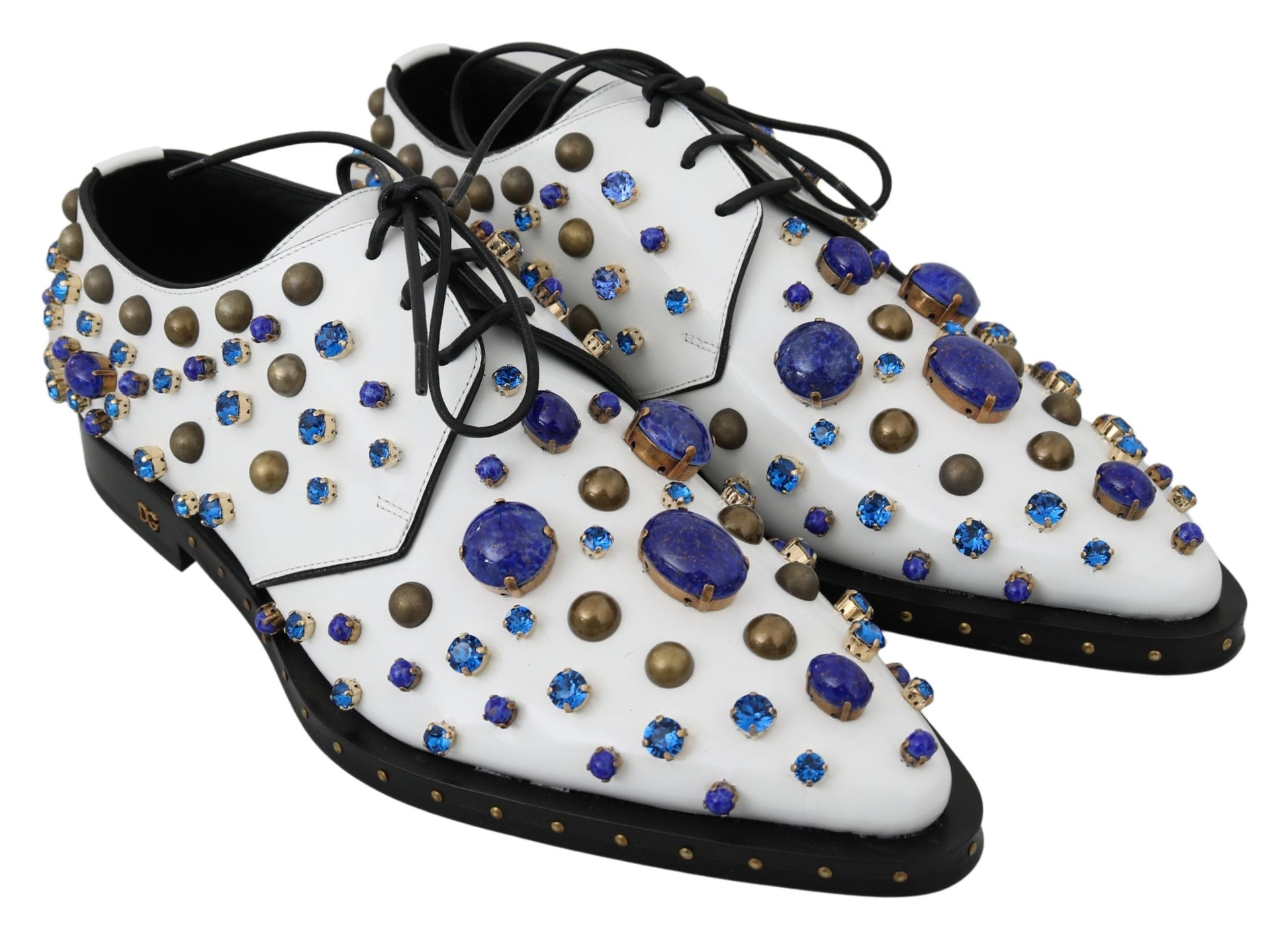 Pair of white shoes with blue and gold embellishments