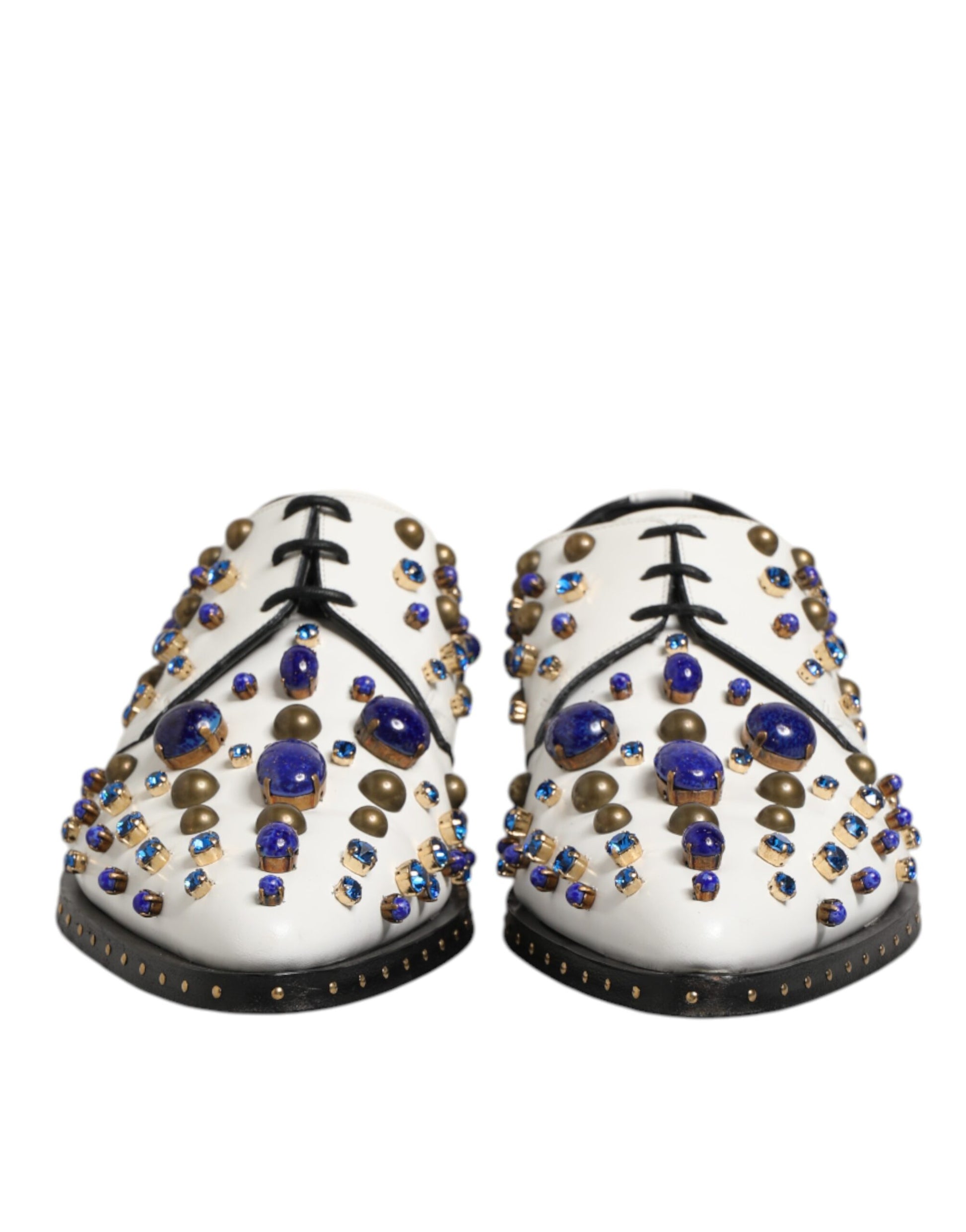 Pair of white leather dress shoes with crystal embellishments and gold accents