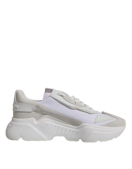 Pink and white sneakers with laces