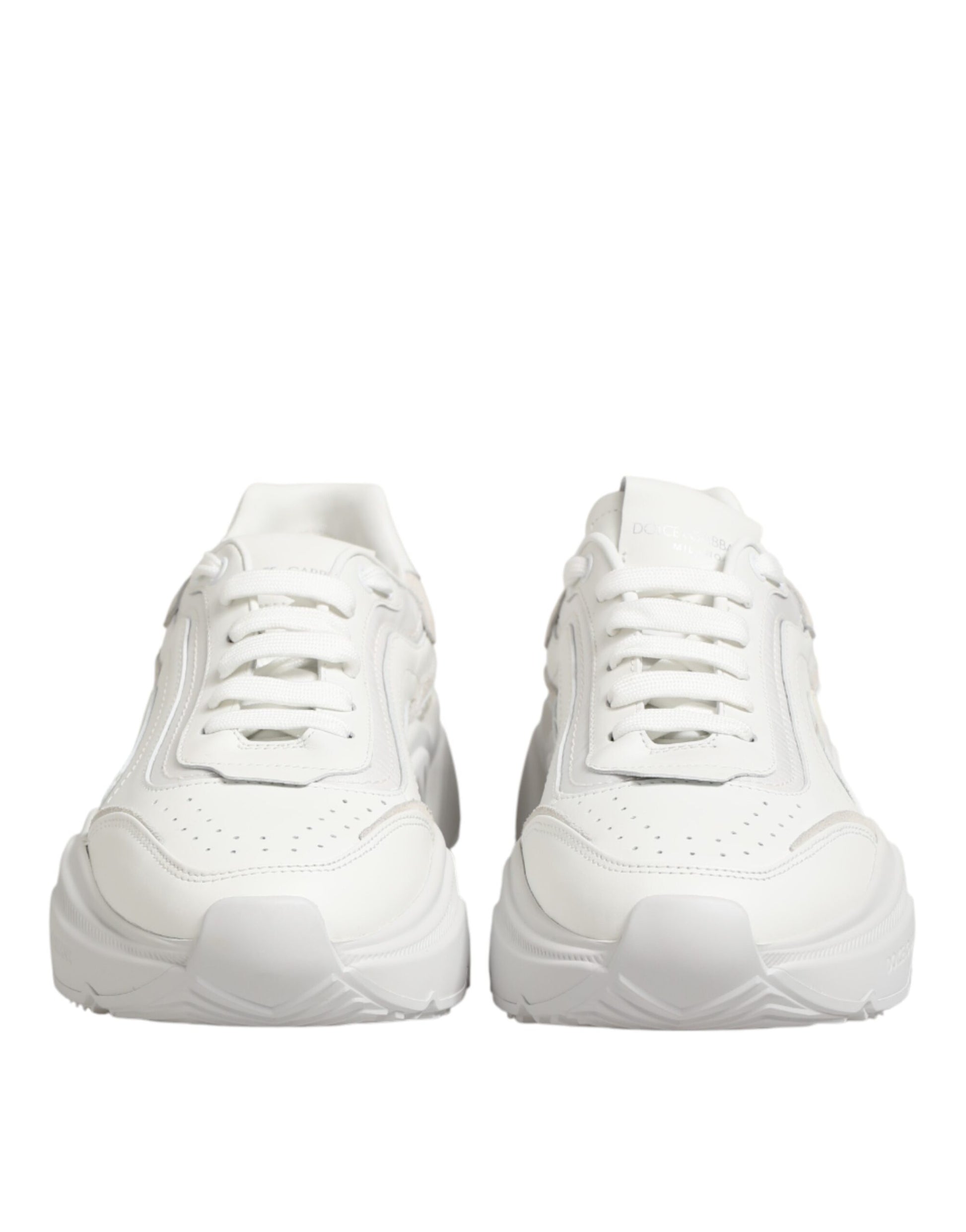 Pair of white sneakers with laces
