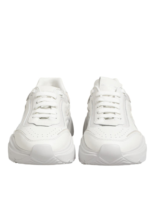 Pair of white sneakers with laces