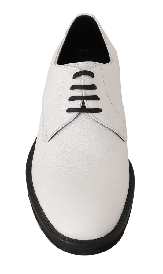 White leather dress shoe with laces and a small heel