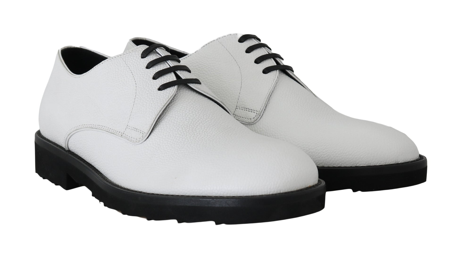Pair of white leather shoes with laces and elastic panels on sides