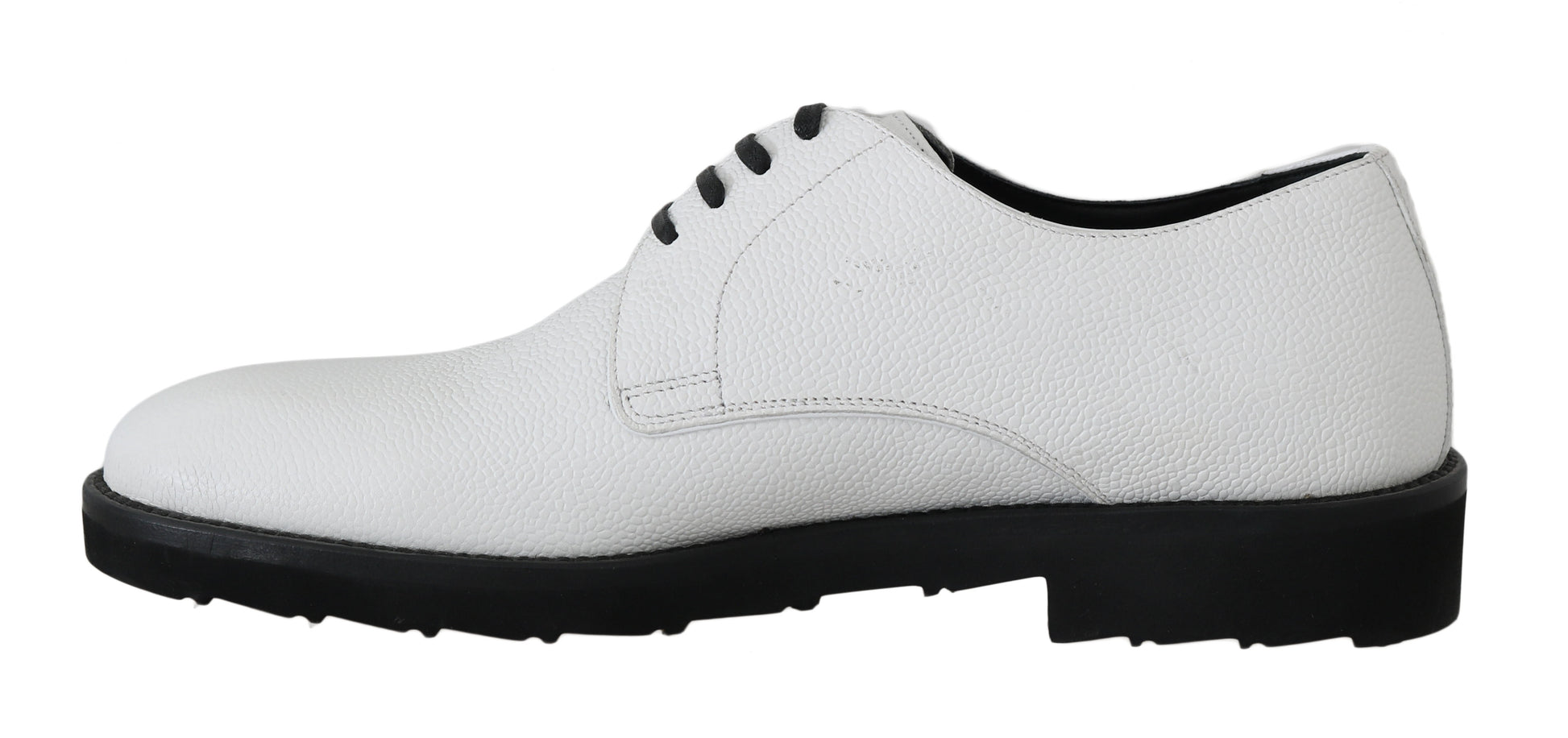 White lace-up shoes with black soles and white laces