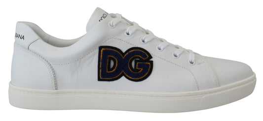 White sneakers with black logo on side and sole