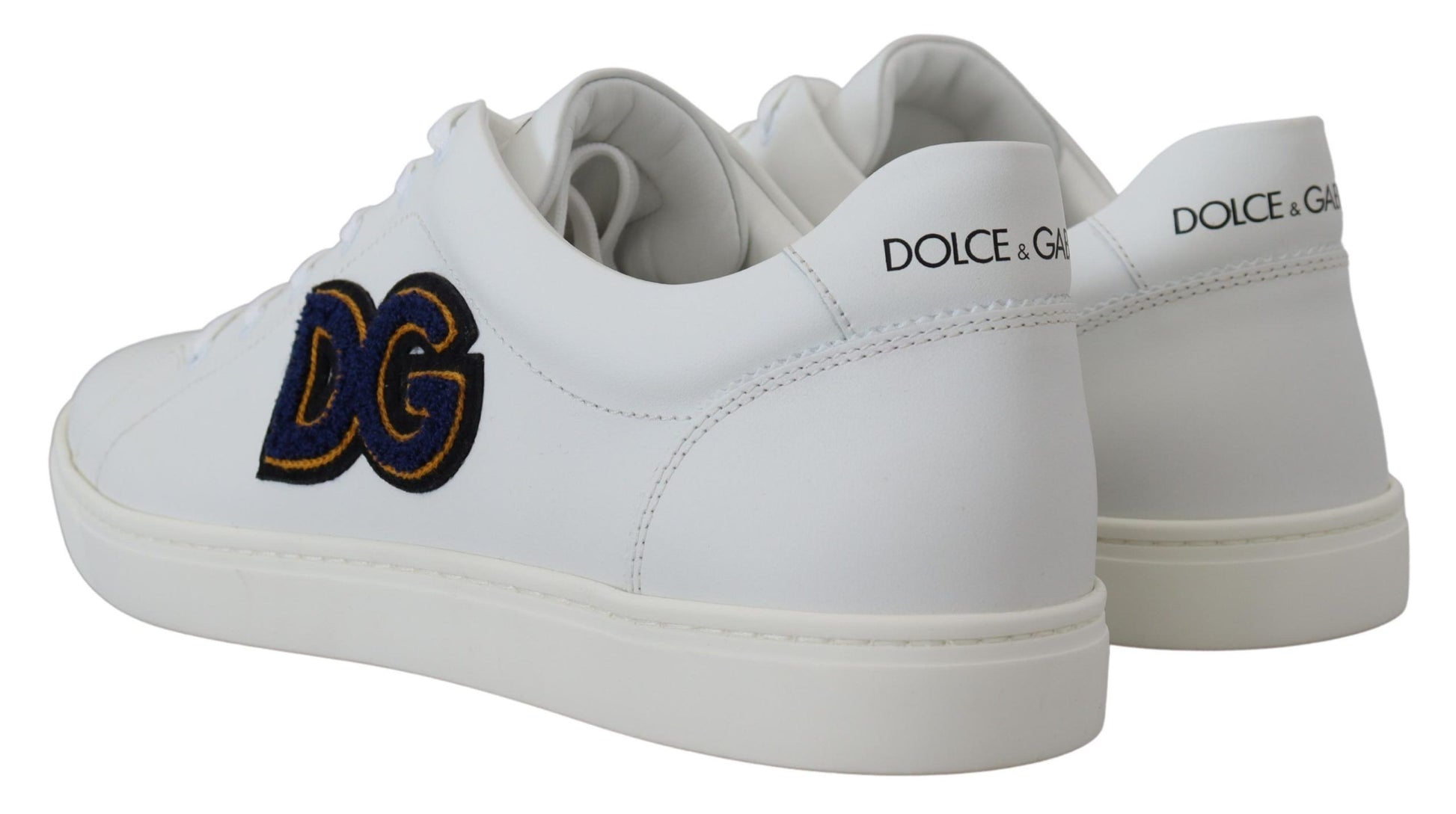 White sneakers with gold logo on side and sole