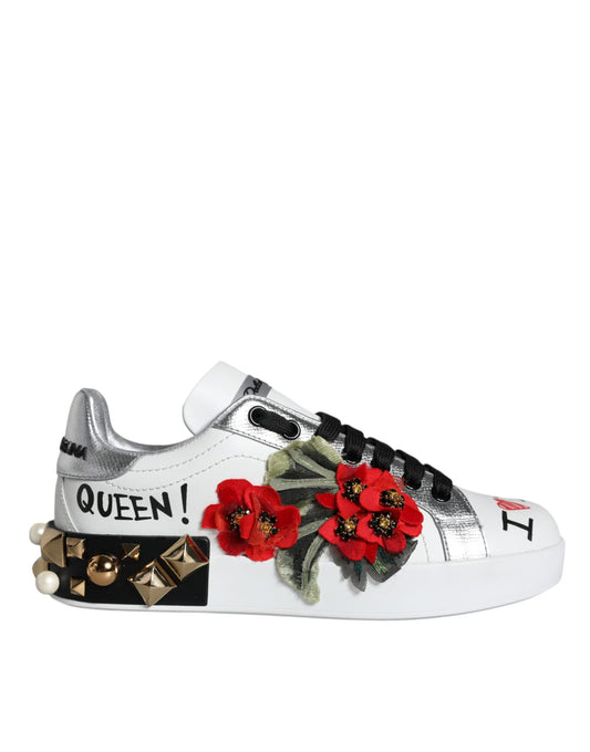 White sneakers with black laces and a floral design on the side